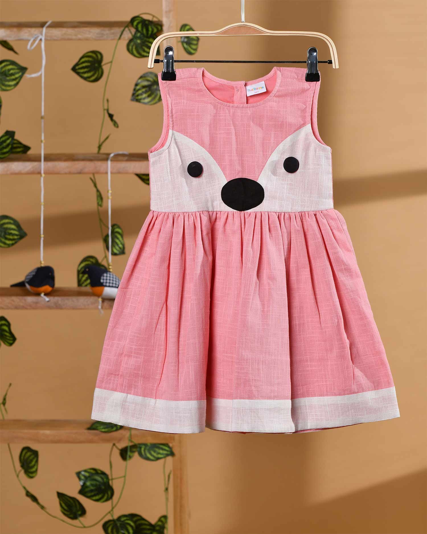 Dress with pink cat design